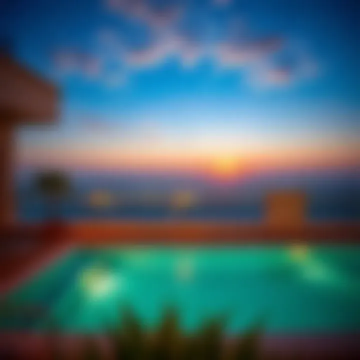 Stunning sunset view from a balcony overlooking a private pool.