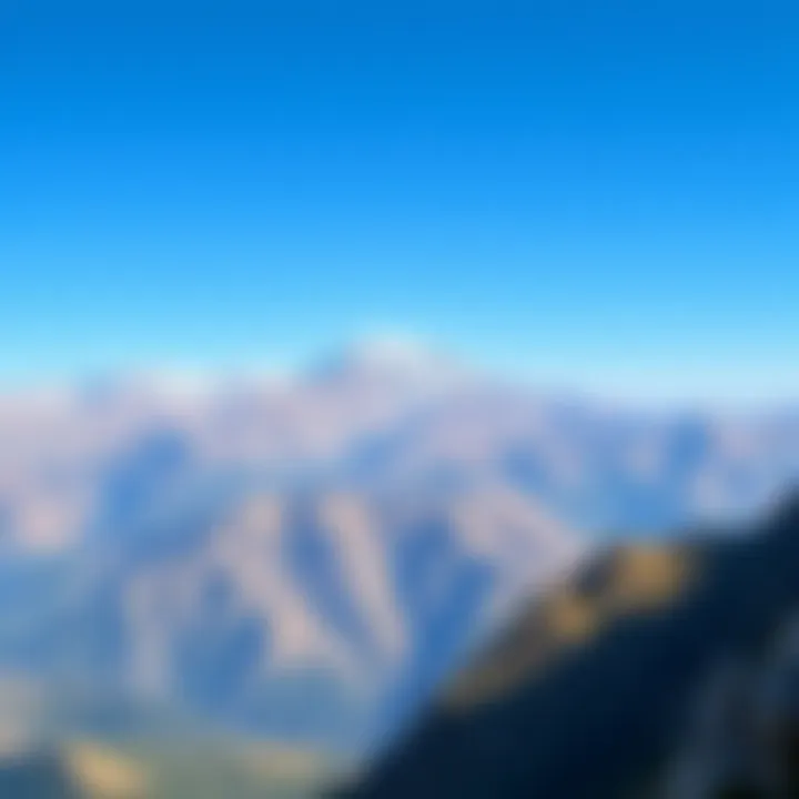 Majestic mountain range under a clear blue sky