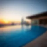 Stunning infinity pool overlooking Dubai skyline at sunset